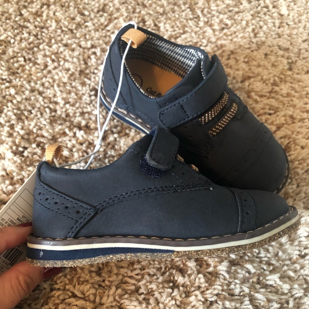 Never worn with tags—Toddler Boy size 7 shoes